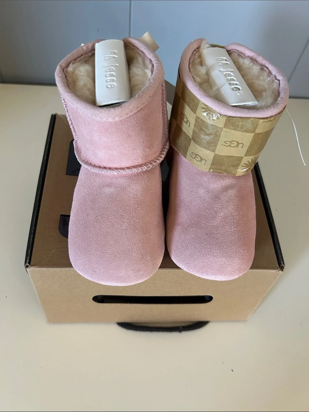 UGG Kids Pink Suede Booties with Bow Detail